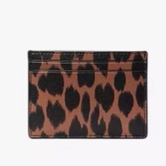 Kate Spade Schuyler Small Slim
Card Holder
NWT SPOTTED ANIMAL COLOR - Picture 8 of 10